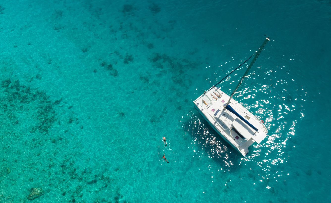 Snorkelling by a catamaran in the Caribbean