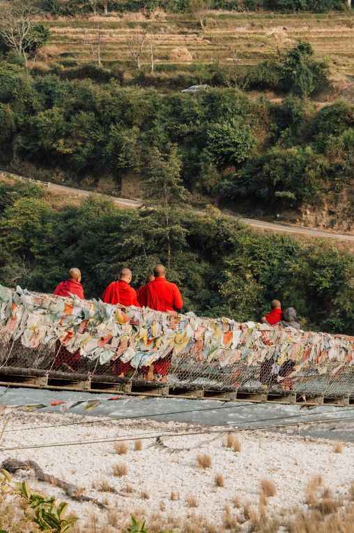 Walking over a river in Bhutan