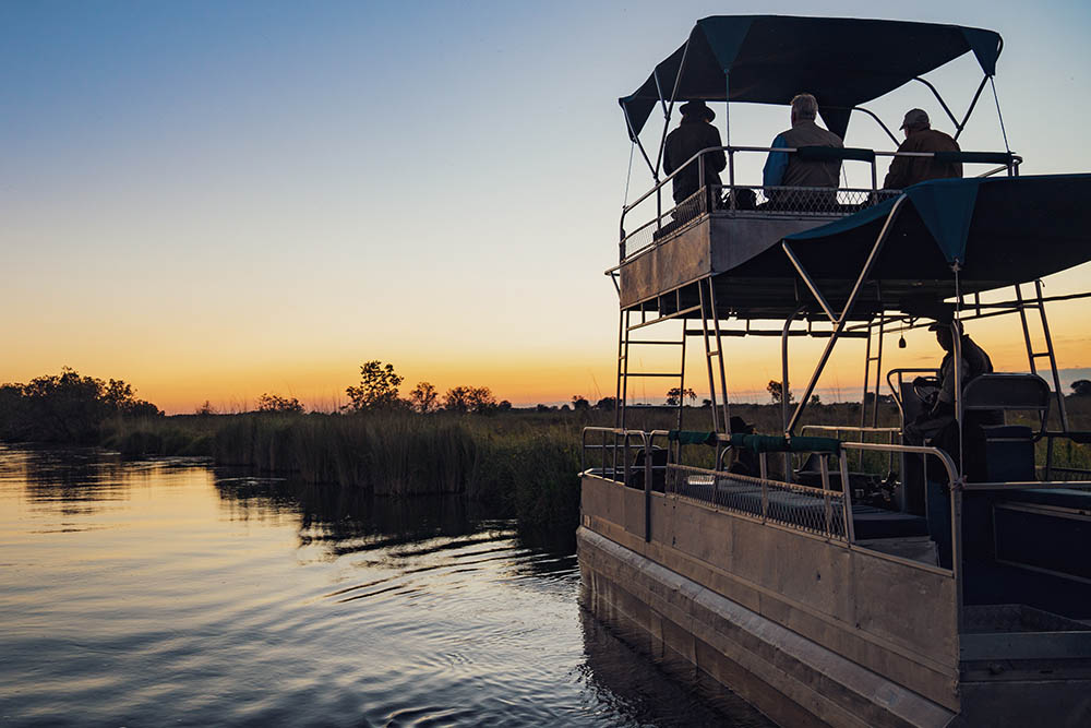 Sunset river safari in Botswana | Luxury Travel Expert