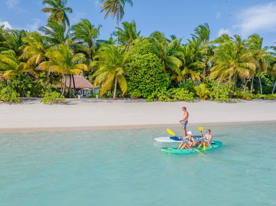 Paddleboarding outside Beach Villa, Alphonse Lodge, Alphonse Island, Seychelles