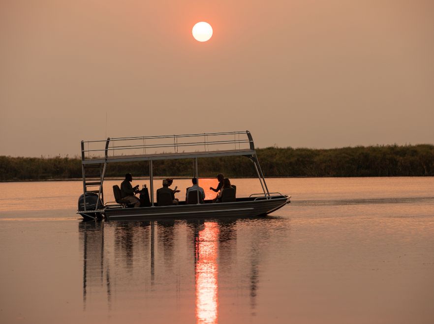 Sundowners on the water at Sitatunga Private Island Camp in the Okavango Delta
