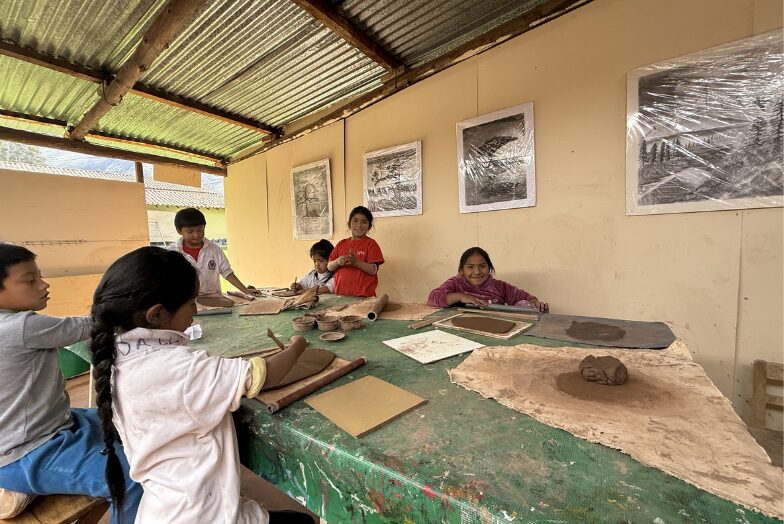 Students learning in a classroom at Sol y Luna School