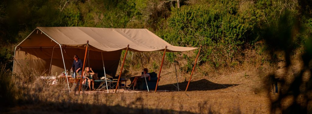 Exterior shot of a canvas tent in the Kenyan bush.