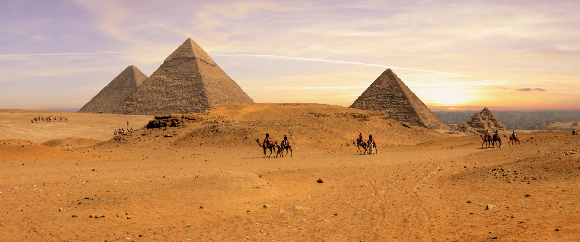 The ancient pyramids of Giza in Egypt against a clear sky