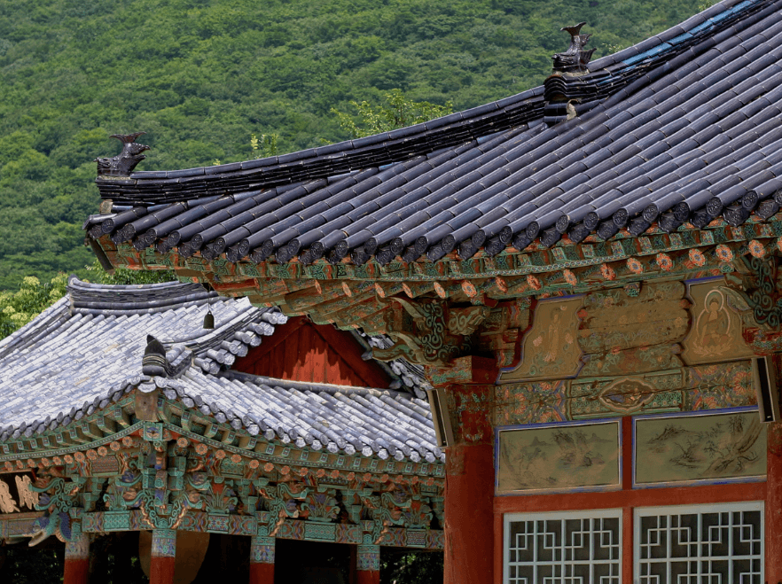 A close-up shot showcasing the intricate, traditional architecture of Beomeosa Temple in South Korea