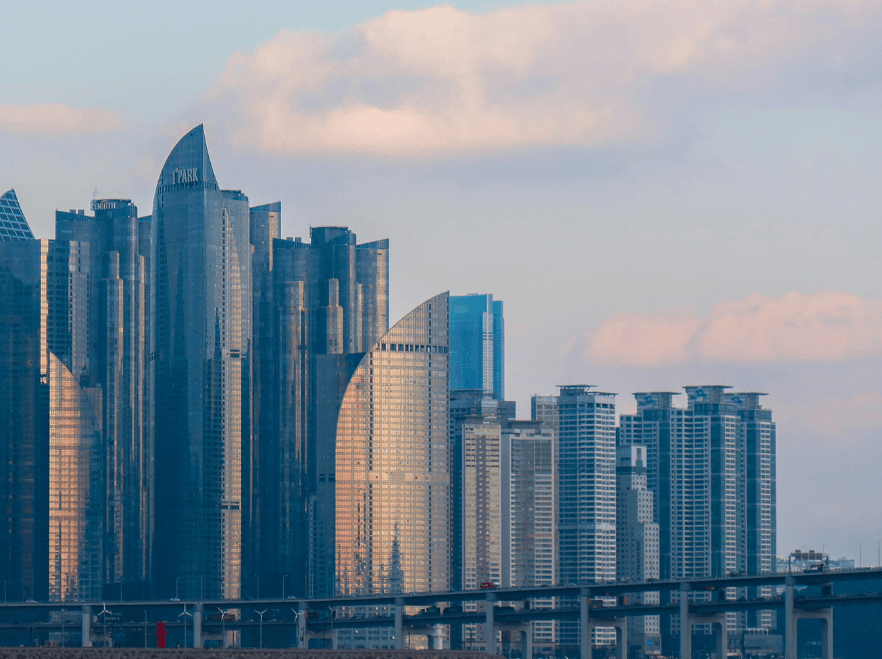 A dense cluster of modern skyscrapers forms the skyline of Marine City in the Haeundae District of Busan, South Korea.